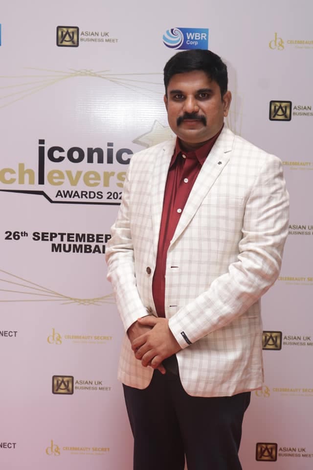 Dr. APJMJ Sheik Saleem at the Iconic Achievers Awards 2021 backdrop, Novotel Hotel, Juhu Beach, Mumbai